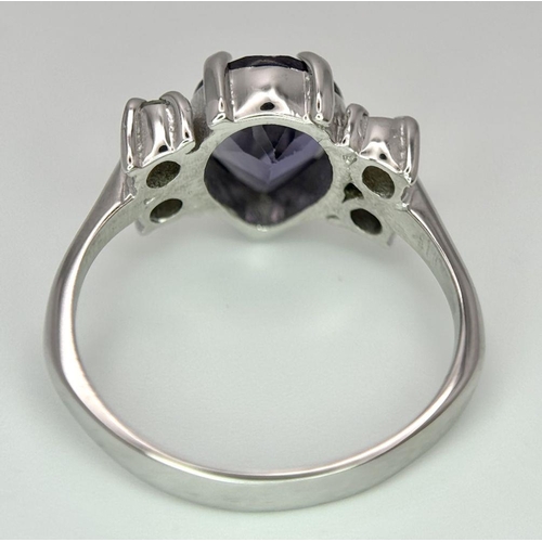 811 - A 9K WHITE GOLD ( TESTED ) DIAMOND SET RING. 4.1G IN WEIGHT. SIZE N AND 1/2. Ref: 7548.