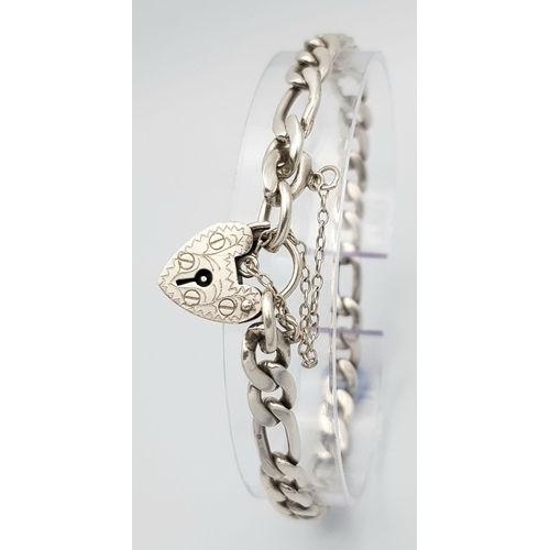 908 - An appealing Solid Silver 925 Figaro Chain Bracelet with Heart Padlock and safety chain, 17.2grams, ... 