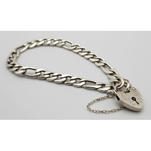 908 - An appealing Solid Silver 925 Figaro Chain Bracelet with Heart Padlock and safety chain, 17.2grams, ... 