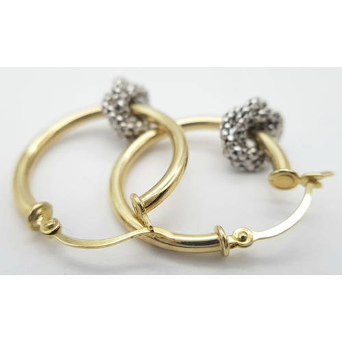 994 - A 9K YELLOW GOLD HOOP EARRINGS WITH WHITE GOLD TWIST ADD ONS. 2G IN WEIGHT. 2CM DIAMETER. Ref: SC 50... 