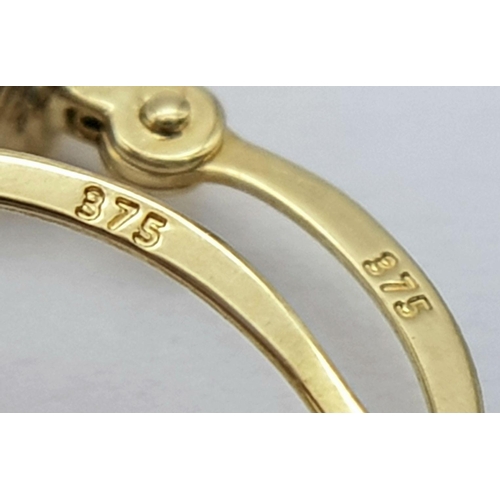 994 - A 9K YELLOW GOLD HOOP EARRINGS WITH WHITE GOLD TWIST ADD ONS. 2G IN WEIGHT. 2CM DIAMETER. Ref: SC 50... 