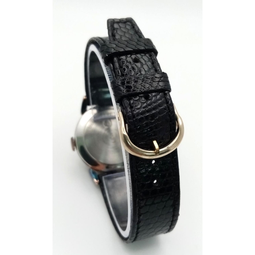 1018 - A Vintage Helbros Mechanical Ladies Watch. Black leather strap. Case - 29mm. Black dial. In working ... 