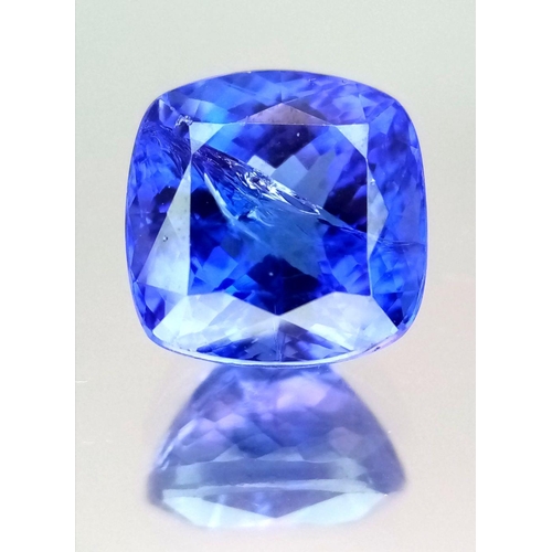 977 - A 7.05ct Cushion Cut Tanzanite Gemstone. Comes with an IDL certificate.