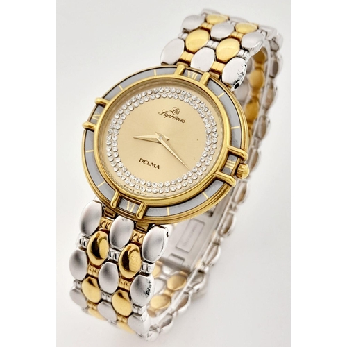 1010 - A Two Tone Les Supremes Stone Set Quartz Ladies Dress Watch. Two tone bracelet and case - 32mm. gild... 