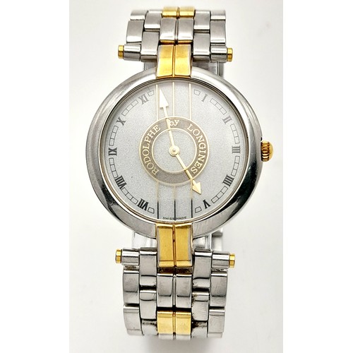 985 - A Longine Rodolph Quartz Gents Watch. Two tone bracelet and case - 33mm. Silver tone dial. In workin... 