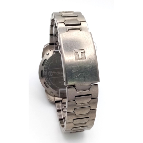 956 - A Tissot Touch Titanium Quartz Gents Watch. Titanium bracelet and case - 44mm. Analogue and digital ... 