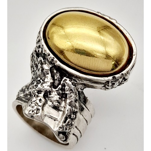 999 - A Designer Yves Saint Laurent Artistic Ring. Size N.