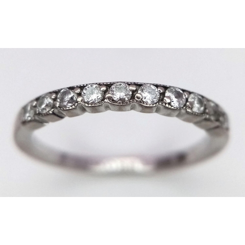 1052 - A Brown's Designer 18K White Gold and Diamond Half Eternity Ring. Size M. Comes with a Browns box. 2... 