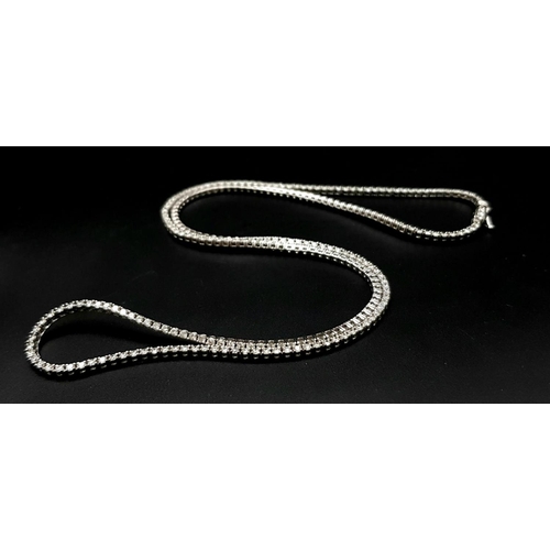 559 - An Icebox 14k White Gold Diamond Tennis Necklace. 256 brilliant round cut diamonds - 7ctw, approx. 5... 