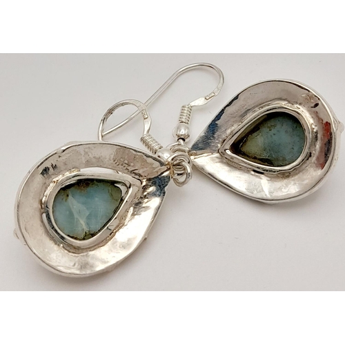 864 - A Pair of Larimar on 925 Silver Drop Earrings. 4cm length, 9.2g total weight. Comes with presentatio... 