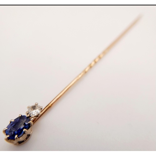 814 - A Vintage 9K Gold Diamond and Sapphire Stick Pin. 7cm. 1.4g total weight.