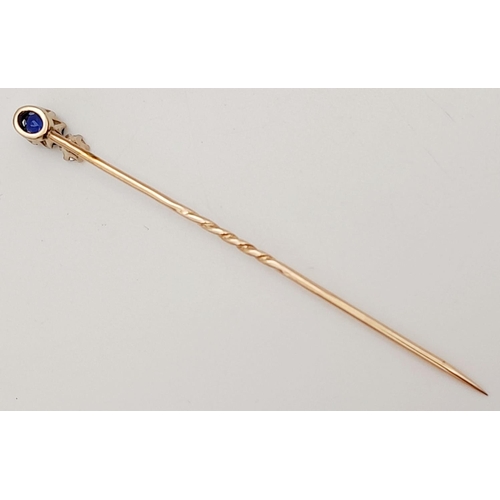 814 - A Vintage 9K Gold Diamond and Sapphire Stick Pin. 7cm. 1.4g total weight.