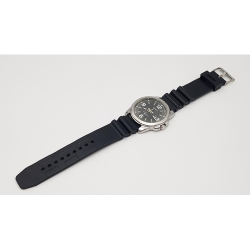 921 - A Casio Quartz Analogue Gents Watch. Black rubber strap. Stainless steel case - 43mm. Black dial wit... 