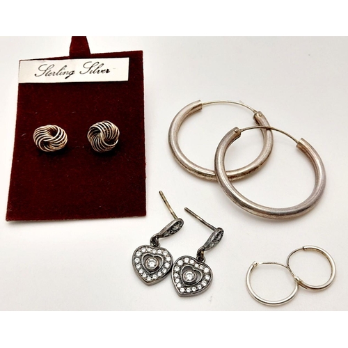 780 - Four pair of earrings, to include stud earrings, hoop earrings and heart shape stone set earrings. P... 