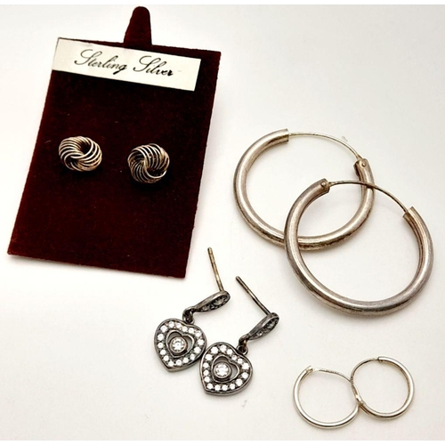 780 - Four pair of earrings, to include stud earrings, hoop earrings and heart shape stone set earrings. P... 