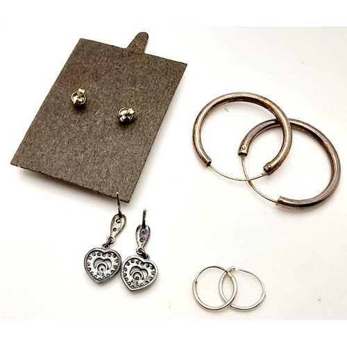 780 - Four pair of earrings, to include stud earrings, hoop earrings and heart shape stone set earrings. P... 