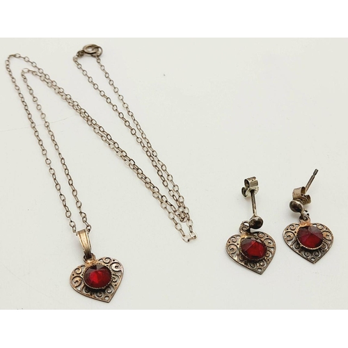 974 - A Sterling Silver Stone-Set Heart Shape Necklace and Earrings Set. Please see photos for details.