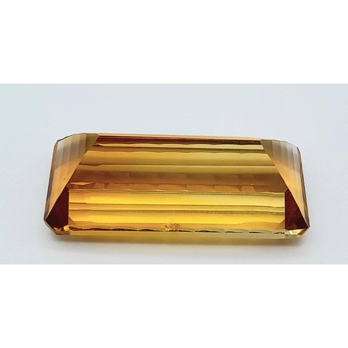 912 - A 49.66ct Brazilian Yellow/Orange Citrine Gemstone - GFCO certified.