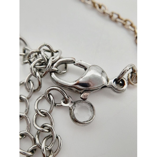 792 - AN ELEGANTLY SHAPED SILVER AND CRYSTAL CHOKER NECKLACE BT 