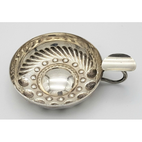 1543 - A Sterling Silver Sommelier Wine Tasting Bowl. Birmingham hallmarks. 10.5cm. 60g.