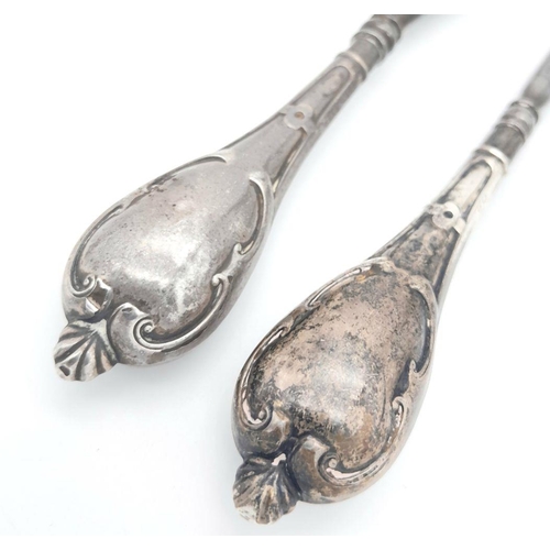 1545 - A Silver Handled Shoe Horn and Silver Handled Button Hook. 18.4cm and 18.9cm length. 95g total weigh... 