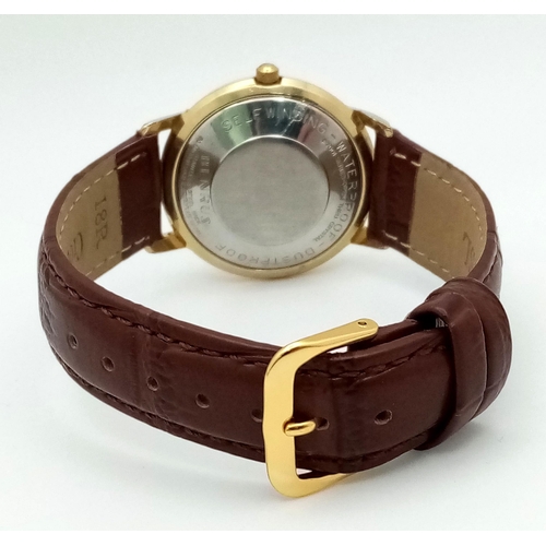 1548 - A Vintage Benrus Gents Mechanical Watch. Brown leather strap. Gilded case - 34mm. Silver tone dial. ... 