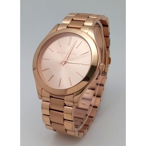 1551 - Rose Gold Tone ‘Michael Kors’ Quartz Watch. 41mm Case. New Battery Fitted June 2024. Full Working Or... 