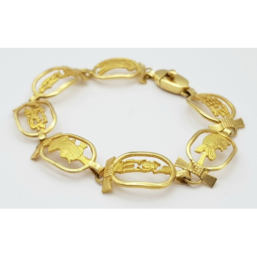 1553 - An 18K Yellow Gold Egyptian Themed Bracelet. 17cm. Hallmarks for 18k gold Cairo. 19.15g.