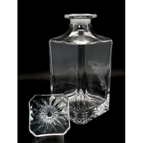 1487 - A Cut-Glass Drinks Decanter with a Spirit of Ecstasy Engraving. 23cm tall.