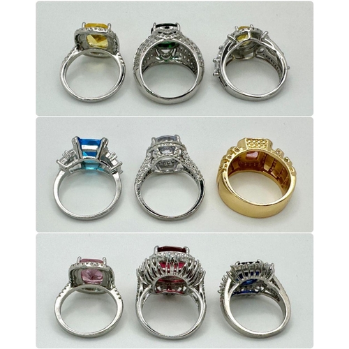 154 - A very eclectic collection of nine glamorous dress rings. All size N-O. Presented in an engraved cry... 