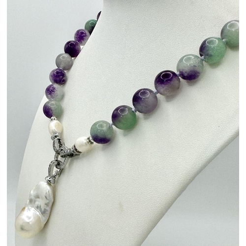 199 - A Green and Red Zoisite Necklace with a Hanging Keshi Baroque Pearl Pendant. 12mm beads. 5.5cm hangi... 