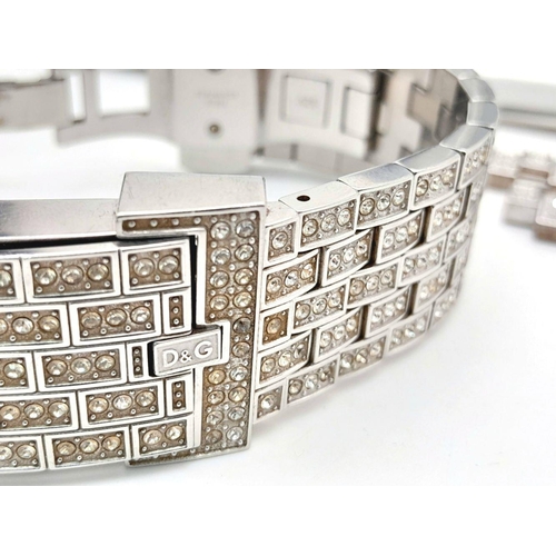 203 - An absolutely stanning, DOLCE & GABBANA TIME ladies bracelet watch, totally covered with “diamanté”,... 