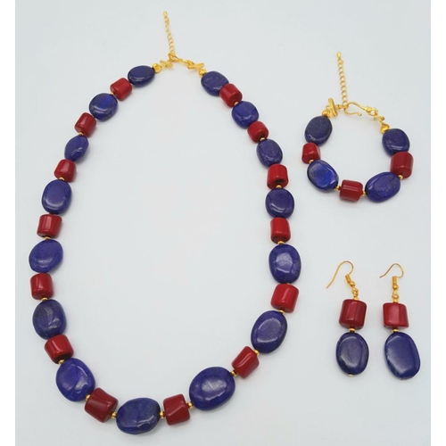 224 - A substantial and very attractive necklace, bracelet and earring set with large oval shaped lapis la... 