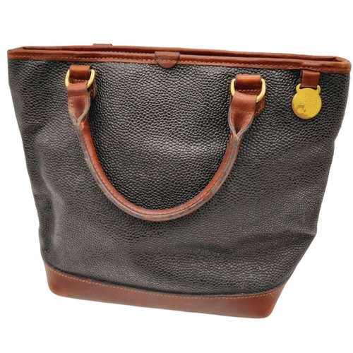 249 - A Vintage Mulberry Small Tote Bag. Black textured leather exterior with burgundy leather accents and... 