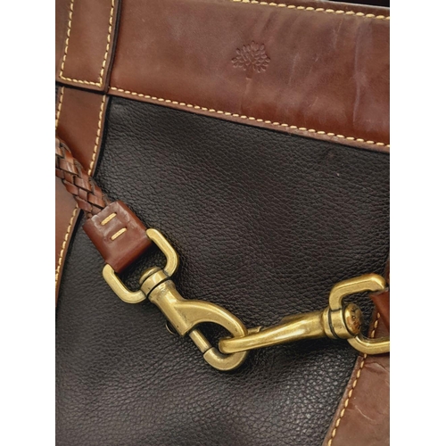 295 - A Mulberry Brown Leather 'Piccadilly' Handbag. Brown leather textured exterior with brown leather tr... 