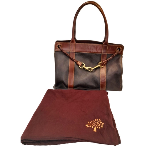 295 - A Mulberry Brown Leather 'Piccadilly' Handbag. Brown leather textured exterior with brown leather tr... 