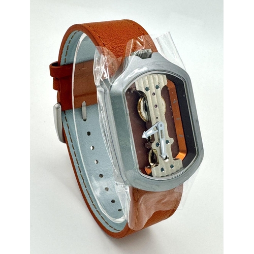 298 - A Verticale Mechanical Top Winder Gents Watch. Brown leather strap. Ceramic silver tone skeleton cas... 