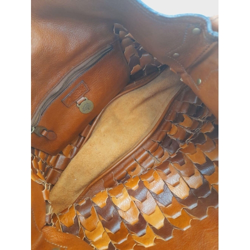 302 - A Mulberry Jemma Rio Hobo Bag. Brown and tan woven leather exterior. Purse-like zipped compartment i... 