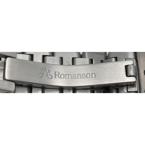 312 - A Romanson Eleve, Bi-Metal and Diamond Quartz Gents Watch. Bi-metal (18k gold and steel) bracelet an... 