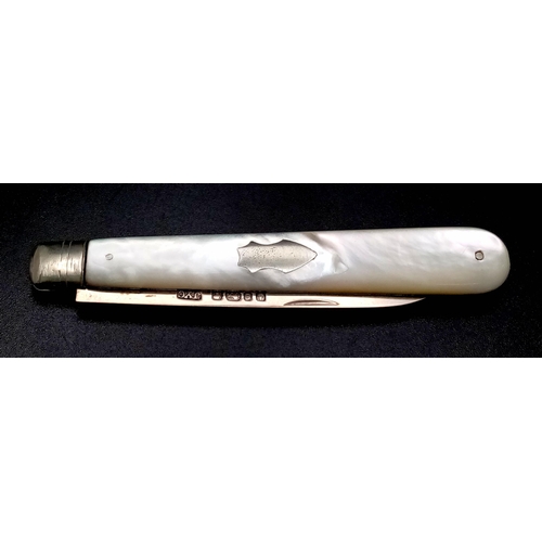 459 - An Excellent Antique Silver Bladed Fruit Knife. Mother of pearl handle with empty cartouche. Hallmar... 