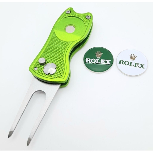 466 - A Rolex Branded 'Flick' - Golf Green Repair Tool - with two Rolex branded ball markers. As new, unus... 