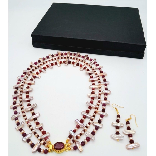 119 - A magnificent three string necklace with long (Biwa) and round pink cultured pearls and round rubies... 