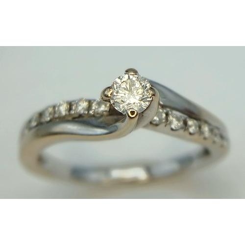 123 - AN 18K WHITE GOLD DIAMOND RING. 0.20CT. 2.4G IN WEIGHT. SIZE J. Ref: SC 6060.