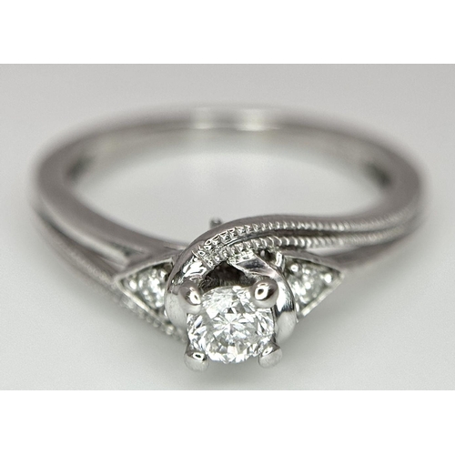 341 - 9K WHITE GOLD DIAMOND RING. 0.33CT. 2.6G IN WEIGHT. SIZE L.
Ref: 8270.