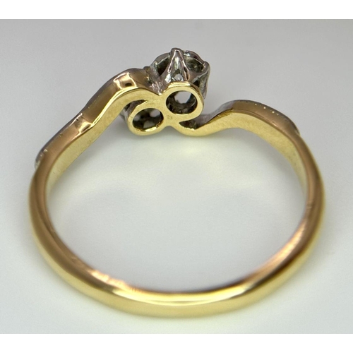 369 - 18K YELLOW GOLD 2 DIAMOND CROSSOVER RING. 2.37G IN WEIGHT. SIZE M.
Ref: SC 6052.