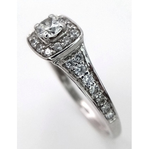 75 - A 18K WHITE GOLD DIAMOND RING. 0.30CT. 2.88G IN WEIGHT. SIZE K. 
Ref: 8265.