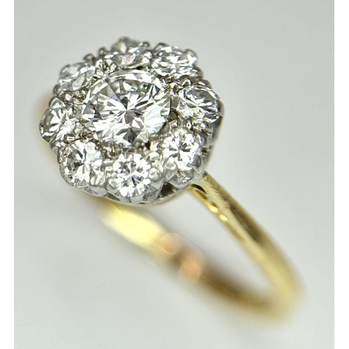 96 - AN 18K YELLOW GOLD DIAMOND CLUSTER RING. 0.55CT. 2.19G IN WEIGHT. SIZE H AND 1/2.

Ref: 7491