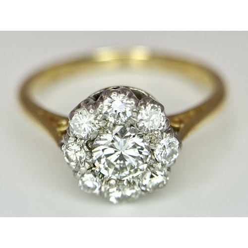 96 - AN 18K YELLOW GOLD DIAMOND CLUSTER RING. 0.55CT. 2.19G IN WEIGHT. SIZE H AND 1/2.

Ref: 7491