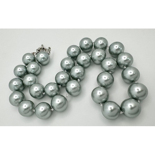 1486 - A Metallic Silver South Sea Pearl Shell Bead Necklace. 14mm beads. 44cm necklace length.