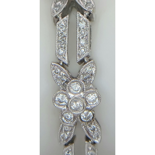 151 - A 14K WHITE GOLD DIAMOND SET BRACELET 1.50CT, 13G TOTAL WEIGHT, 19CM LENGTH.

ref: SC 6065